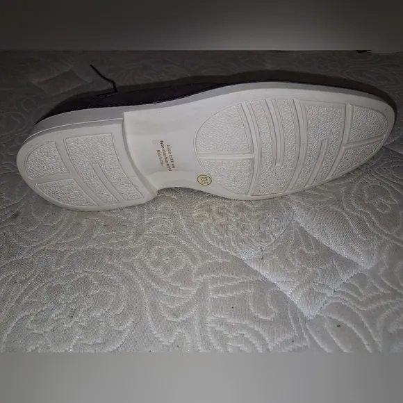 A pair of Franco Vanucci brown suede men's loafers in a size 10.5. EUC.