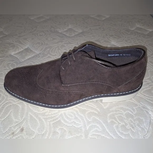 A pair of Franco Vanucci brown suede men's loafers in a size 10.5. EUC.