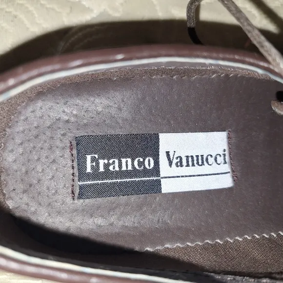 A pair of Franco Vanucci brown suede men's loafers in a size 10.5. EUC.