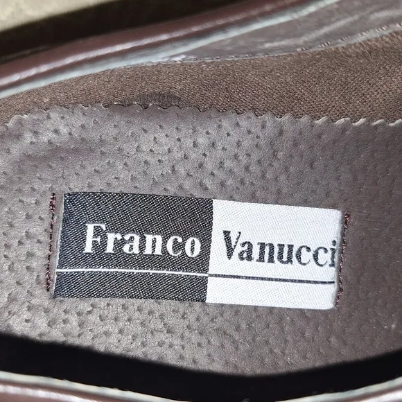 A pair of Franco Vanucci brown suede men's loafers in a size 10.5. EUC.