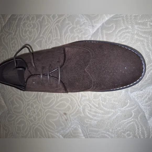 A pair of Franco Vanucci brown suede men's loafers in a size 10.5. EUC.