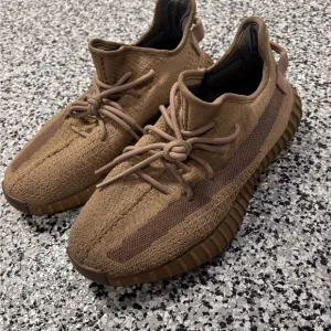 Adidas Brown Sneakers with Boost Cushioning