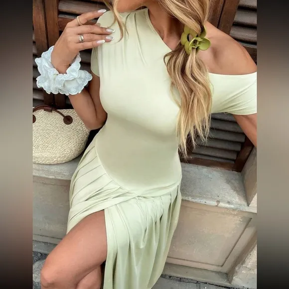 Asymmetrical sleeve mint green pleated midi drop waist dress, stretchy material