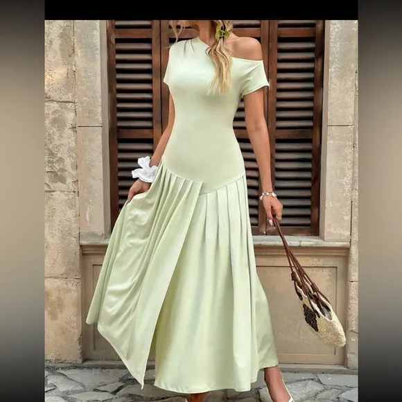 Asymmetrical sleeve mint green pleated midi drop waist dress, stretchy material