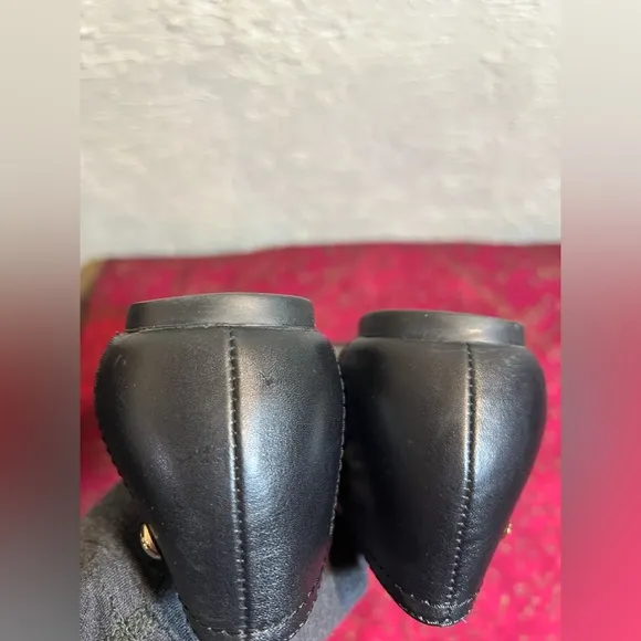 COACH skin flats, EUC, black, grey w gold tone hardware. 7M very minimal wear.