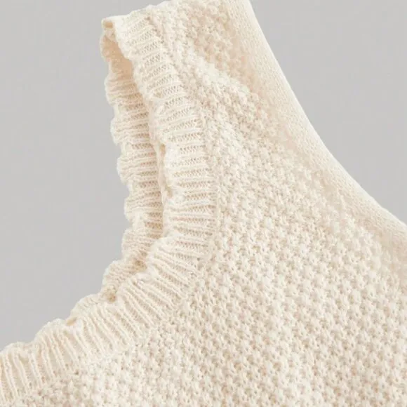 Elegant Sleeveless Rib-Knit Sweater Dress
