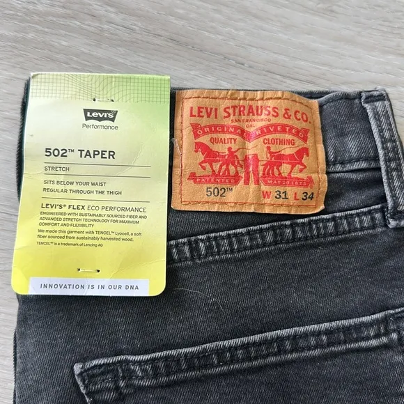 Levi’s Performance 502 Taper Stretch Space Walk Black 31x34 NWT