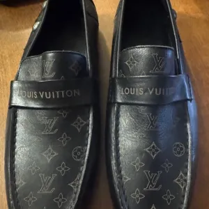 Louis Vuitton Black Loafers with Monogram and Leather Strap