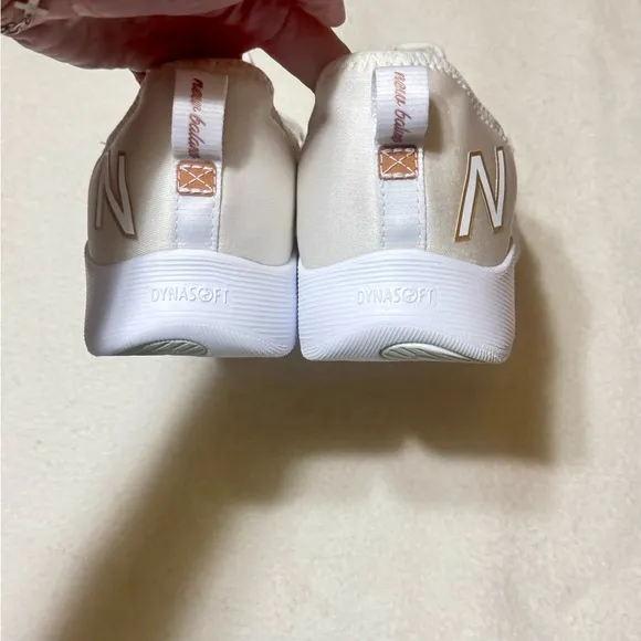 New Balance White and Gold Sneakers