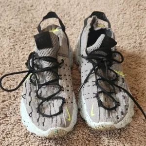 Nike Gray and Black Knit Sneakers with Neon Accents