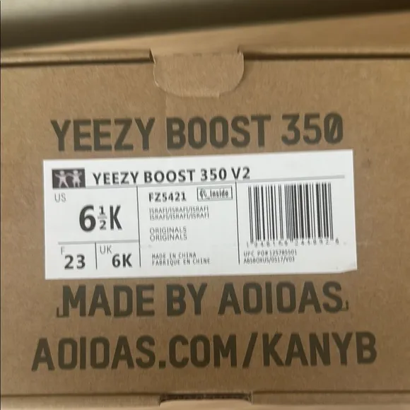 Yeezy Gray and Cream Sneakers with Modern Knit Design