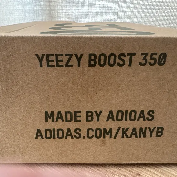 Yeezy Gray and Cream Sneakers with Modern Knit Design